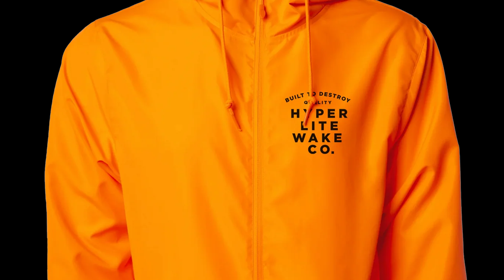Bright orange jacket with Hyperlite Wake Co. text on the chest.